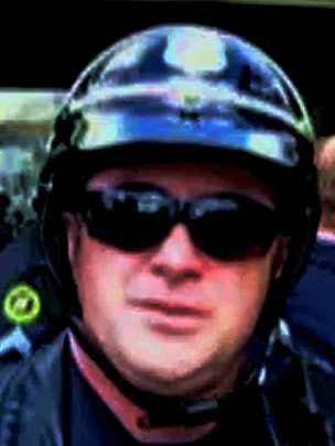 Milwaukee Police Officer Joseph Anderer (the camera breaker)